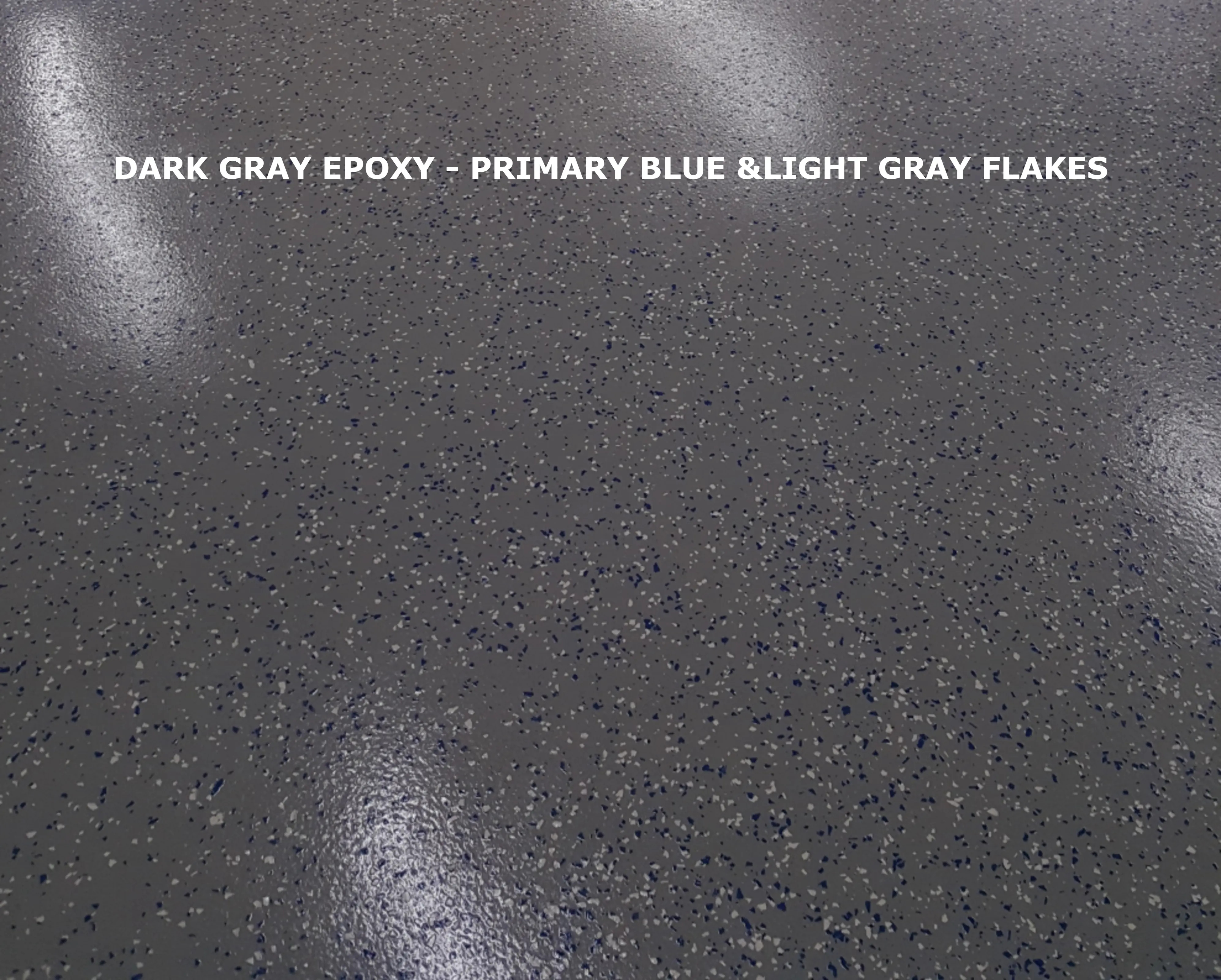 Close-up of Armor Chip epoxy floor texture — Dark Gray with Black, White, and Primary Blue flakes